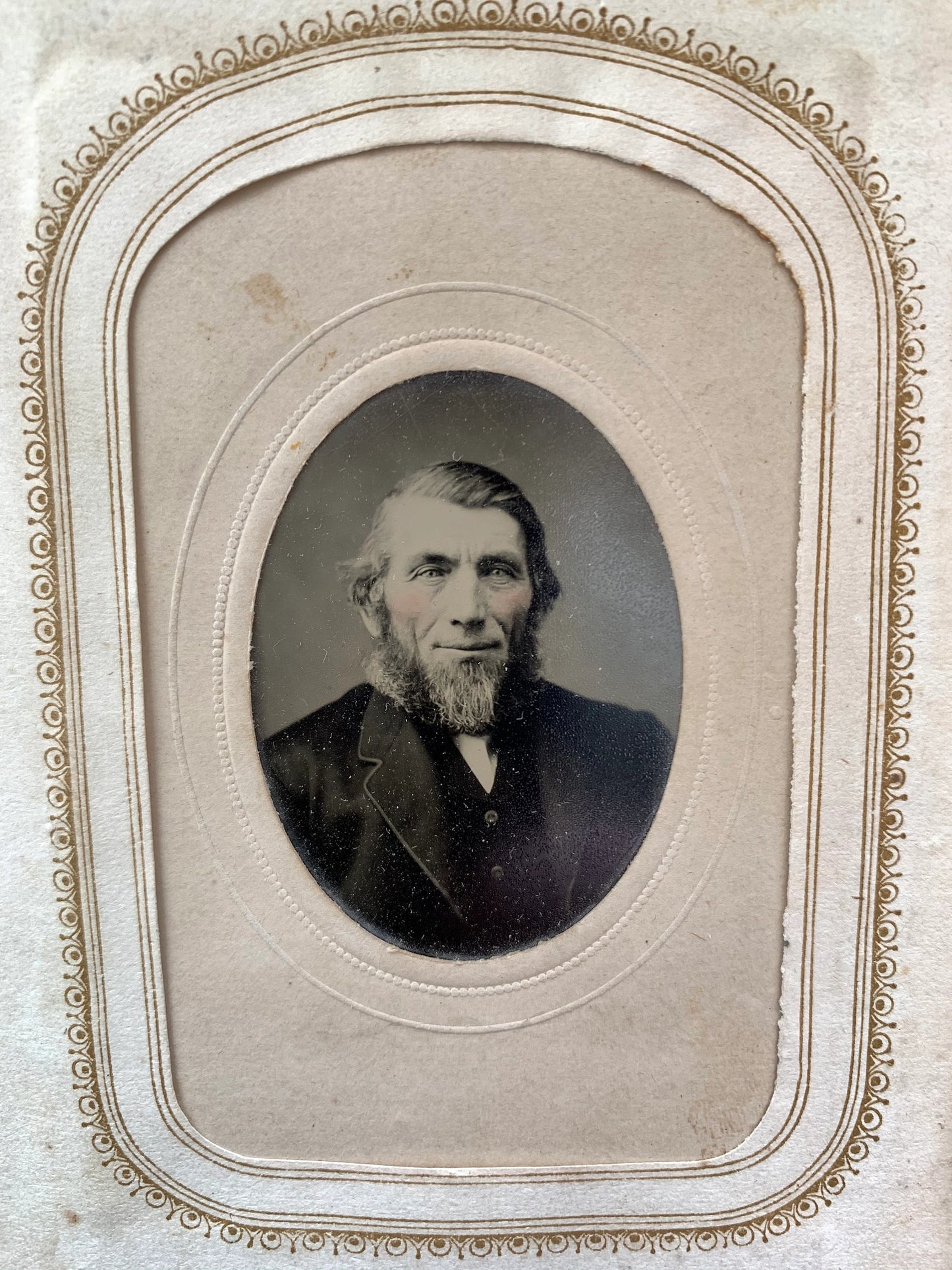 Victorian Era Tintype of a Bearded Older Man with Hand Painted Rosy Cheeks, 1860s-1870s