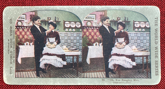 Oh, You Naughty Man - Man With His Arm Around a Woman's Shoulder in a Kitchen - Stereo View Card - Early 1900s