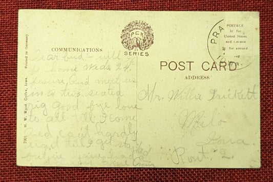 This is a used postcard in very good condition featuring East Howard Street in Colfax, Iowa. It look
