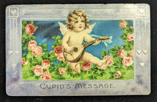Cupid's Message With Cupid Playing the Guitar - Vitnage Valentine Postcard