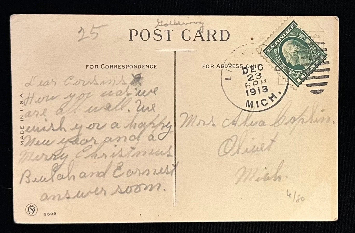 Vintage postcard with handwritten text and postage stamp, featuring a black border.