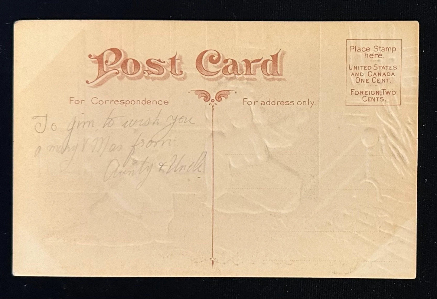 Children by the Fireplace with Stockings - A Merry Christmas - Vintage Postcard