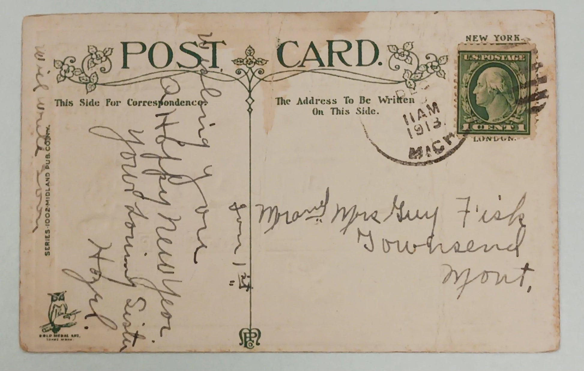 Vintage postcard with postage stamp and handwritten text on a light gray background