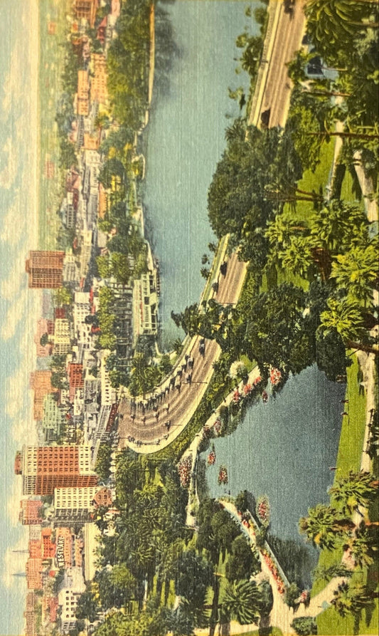 General Douglas MacArthur Park showing Wilshire Boulevard and the Westlake Shopping District. - Los Angeles, California  -  Linen Postcard