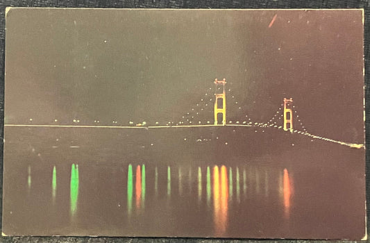 Michigan’s Mighty Mackinac Bridge  at Night - Photo by Hoyt Louis Avery - Vintage Postcard