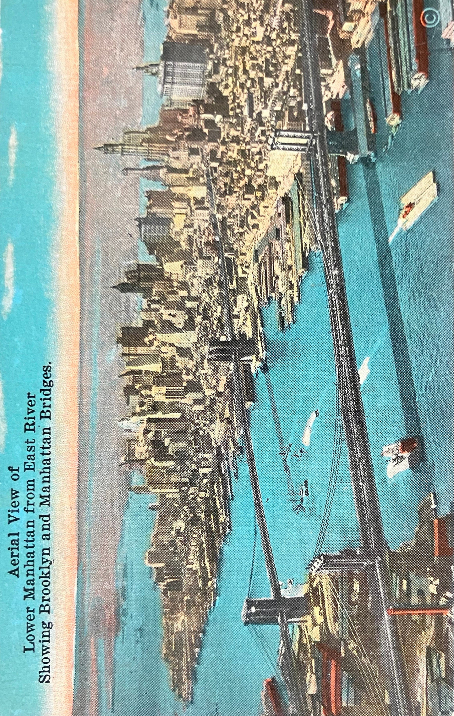 Aerial View of Lower Manhattan from East River Showing Brooklyn and Manhattan Bridges. - Vintage Postcard with hand tinted photo
