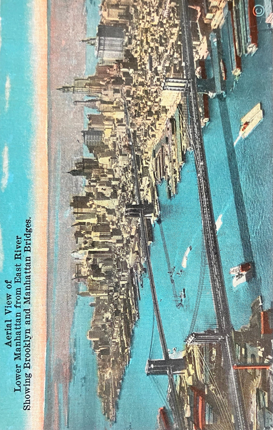 Aerial View of Lower Manhattan from East River Showing Brooklyn and Manhattan Bridges. - Vintage Postcard with hand tinted photo