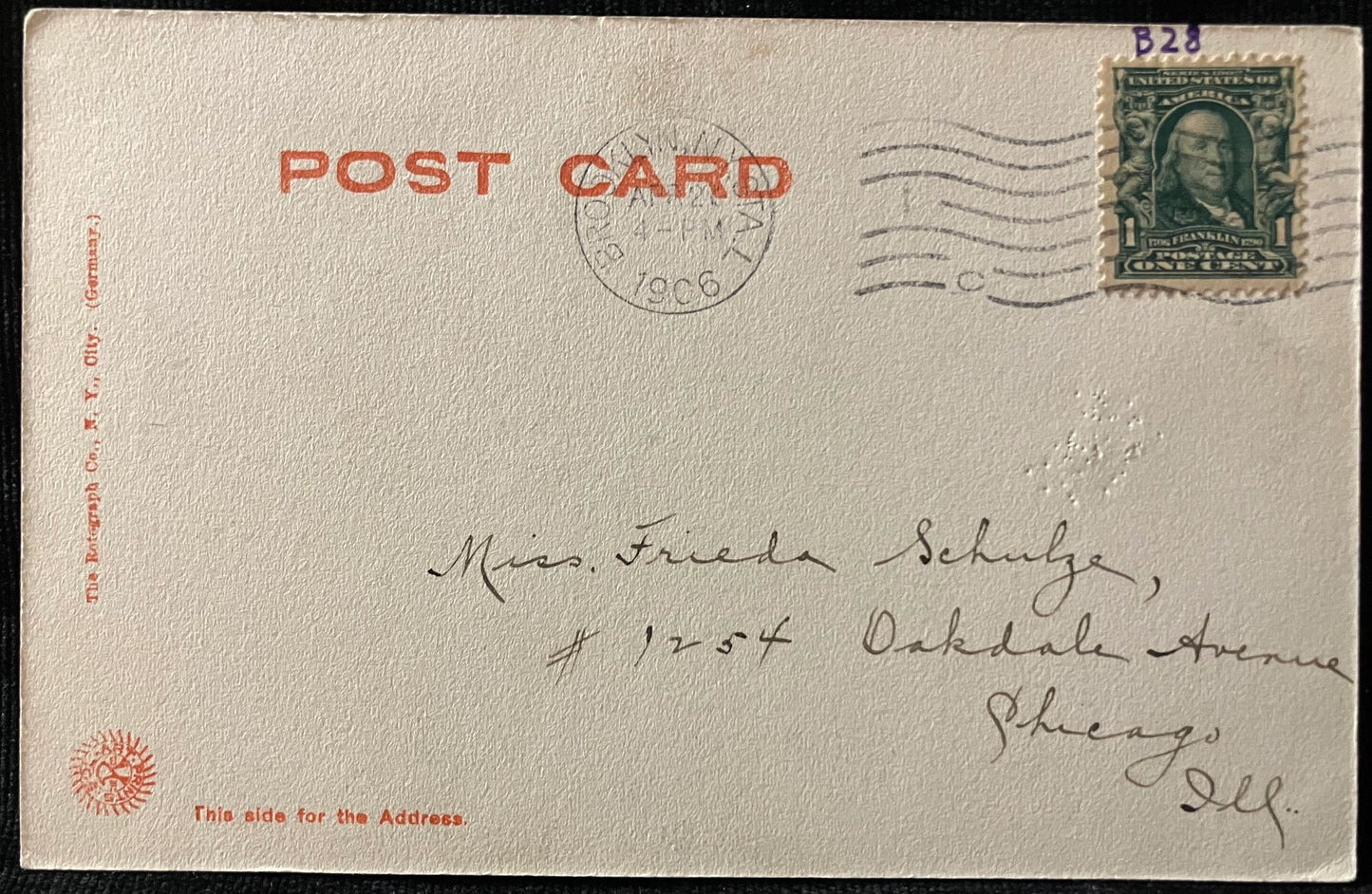 Vintage postcard with postage stamp and sender's address
