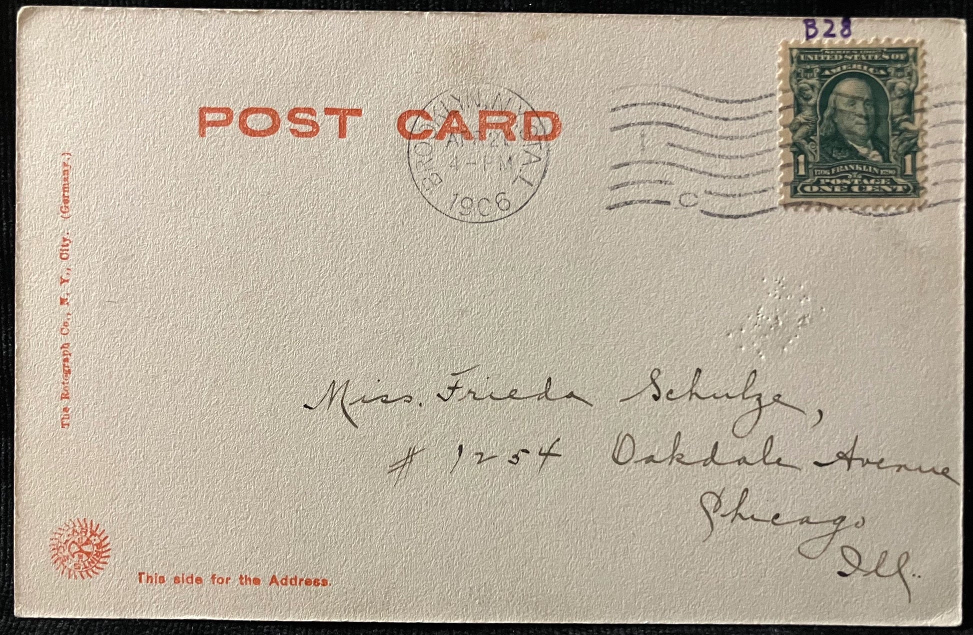 Vintage postcard with postage stamp and sender's address