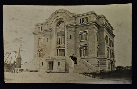 RPPC - Four Men Standing on Steps of a 3.5 Storied Brick Building in Detroit, Michigan - The Building looks to be under construction - Sepia colored