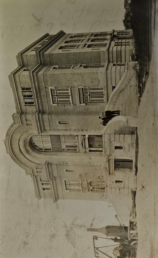 RPPC - Four Men Standing on Steps of a 3.5 Storied Brick Building in Detroit, Michigan - The Building looks to be under construction - Sepia colored