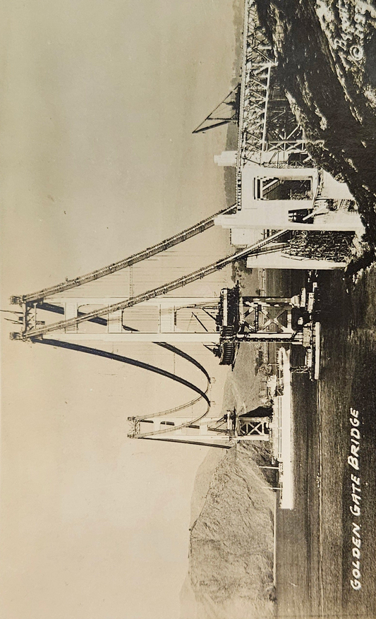 RPPC - Golden Gate Bridge Under Construction - 1935 Postcard Black/ White Photo - Bridge Construction Photo - Naval Ship Passing under Bridge