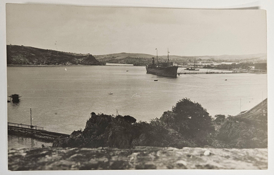 Photo Of Large Battle Ship Entering a Valley Harbor - 1930 to 1940