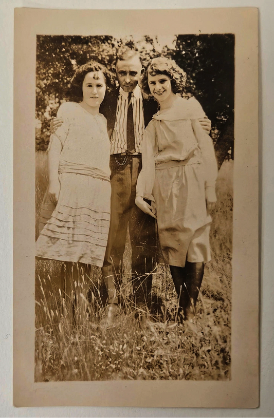 1915 Photo of 3 Well Dressed Siblings Smiling - Older Brother with younger Sisters Casual Photo outdoors - Sepia Tone Photograph