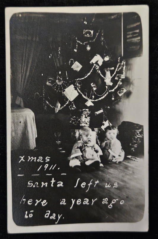 RPPC - 1911 Christmas Tree with Babies - "Xmas 1911 Santa left us here a year ago today" - The Twins First Birthday under Fancy Decorated Tree
