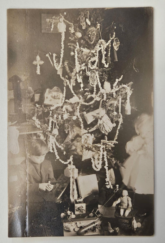 RPPC - Early 1900s Christmas Tree - Decorated With Tinsel and Popcorn Garlands, Masks, Toys and More - Children Opening Gifts under Tree
