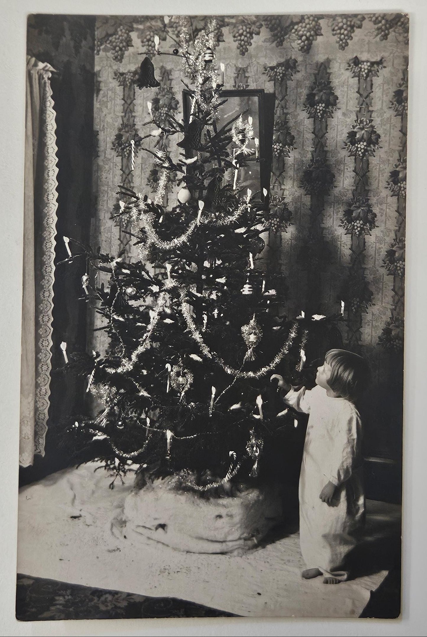 RPPC - Small Child by Christmas Tree - Tree with Garlands, Ornaments and Real Burning Candles -  Christmas Photo Card from Early 1900 - Real Photo Postcard