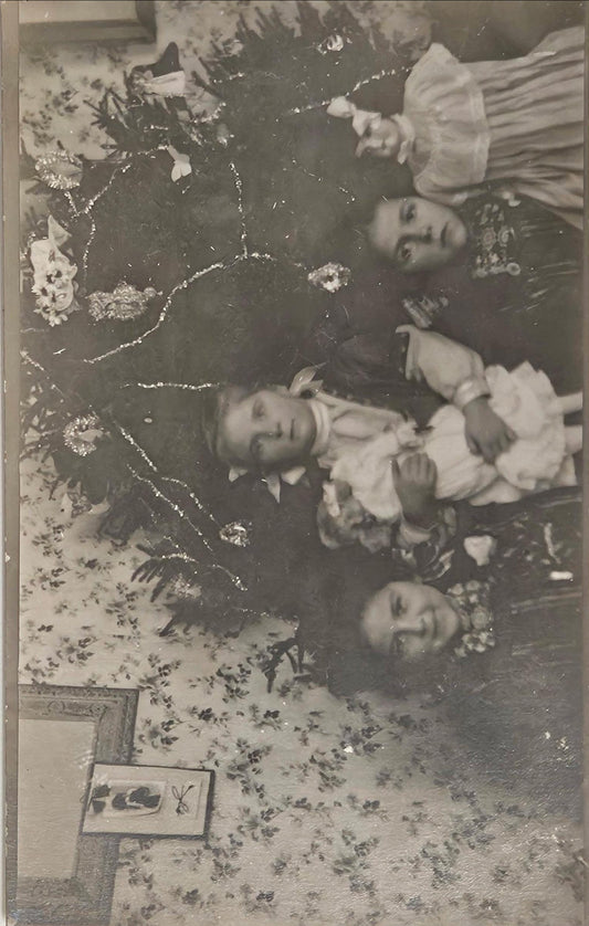 RPPC - 3 Little Girls with Dolls by Christmas Tree - 1920 Family Holiday Photo Postcard - Real Tree with Tinsel Christmas Decorations