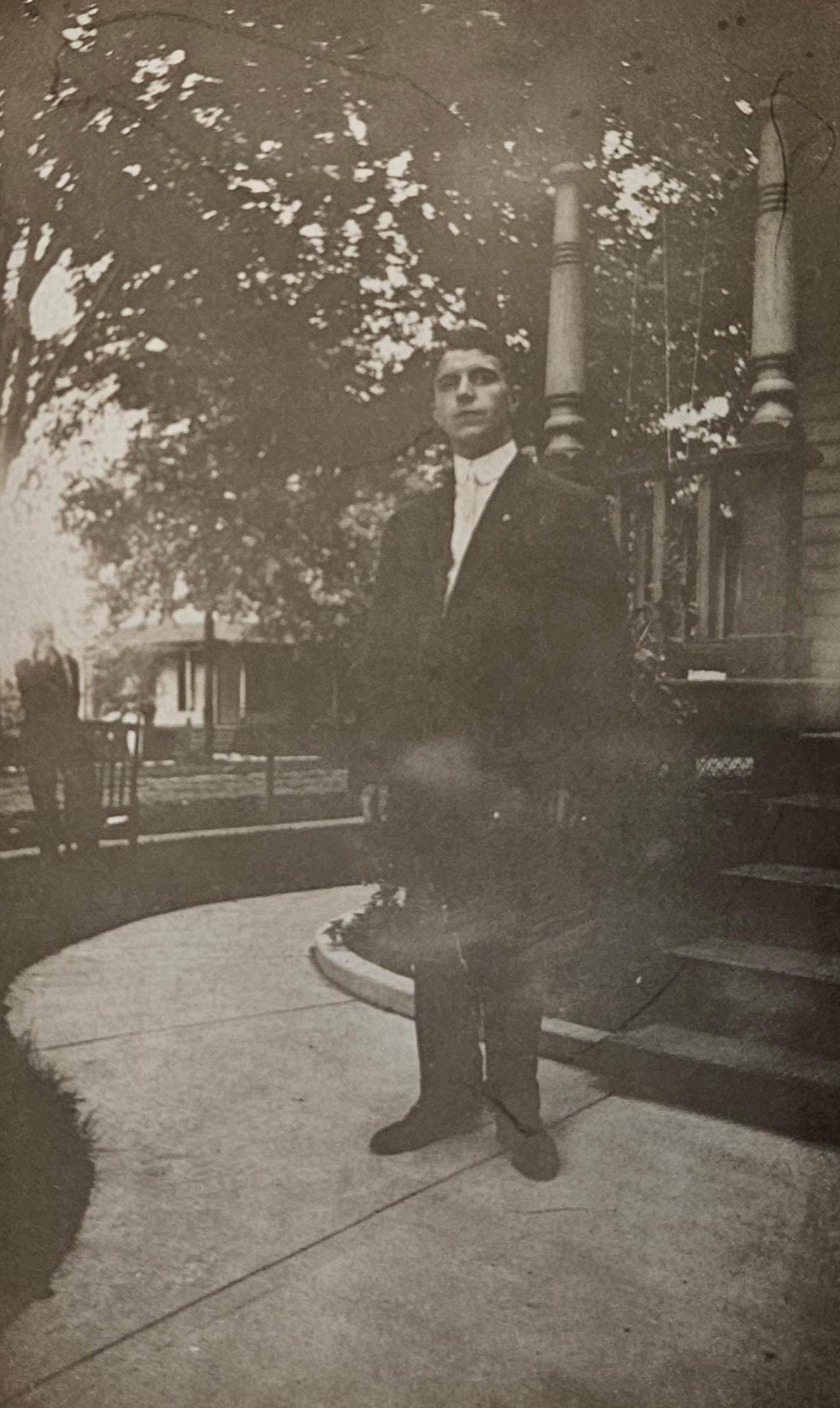 RPPC - Portrait - Young Man in Suit by Porch Steps about 1915 - stampbox was dated 1904 to 1918  - Full bleed photo -Maybe J. Edgar Hoover