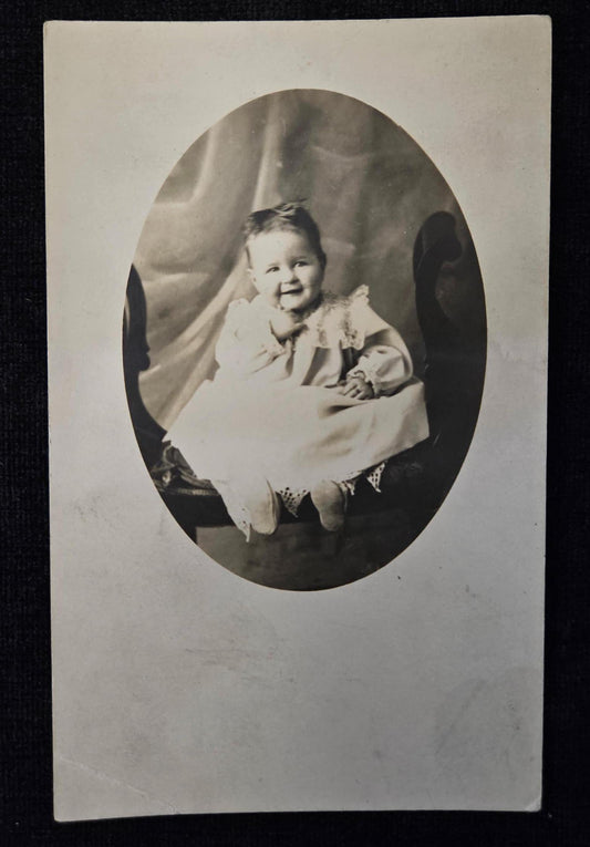 RPPC - Cute Smiling Baby Evelyn - Oval Shaped Portrait Photo - 14 month Old Toddler on Bench 1910 - Owen Publishing Danville New York