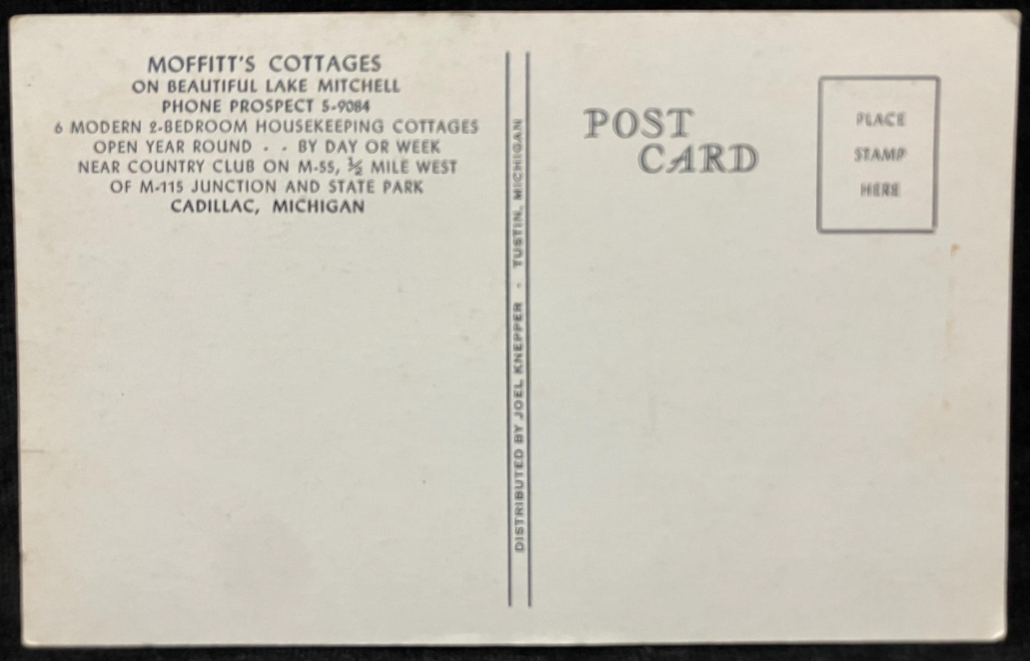 Back of a postcard from Moffitt's Cottages with text and a stamp area.