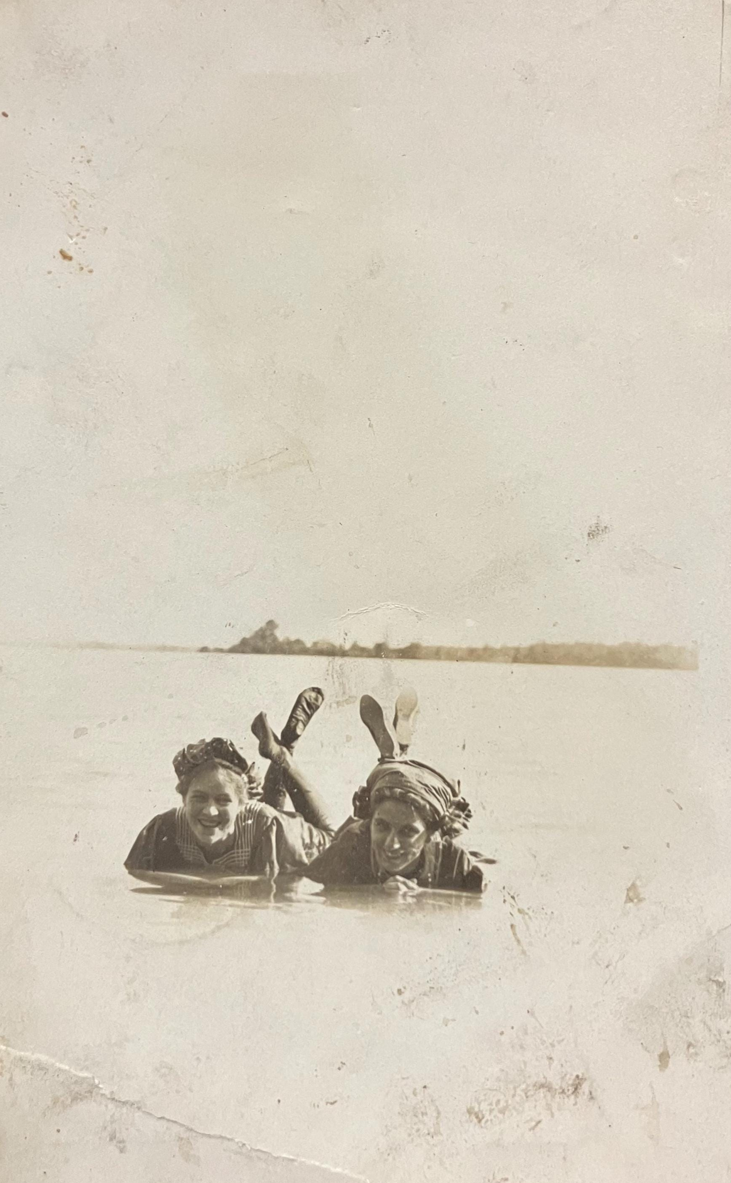 RPPC - Two Young Women Enjoying a Lake - Feet up out of the Water - 1910 Grayling, Michigan -Bathingwear with caps Lake life postcard