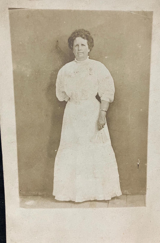 RPPC - Mature Lady in White posing with a White Fan - 1920s Real Photo Postcard