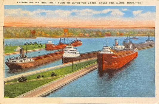 Freighters Waiting Their Turn to Enter the Locks - Sault Ste. Marie, Michigan - 1940s Linen Postcard