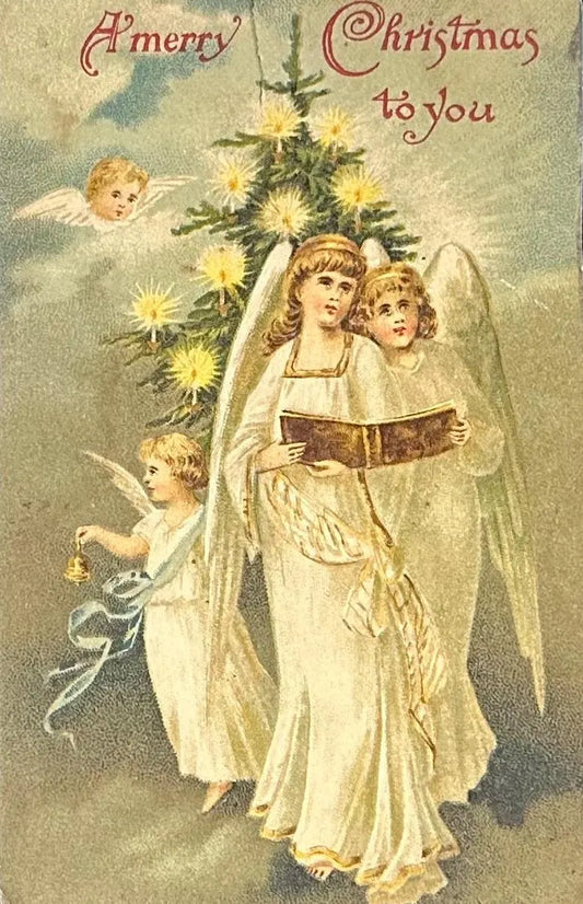 Angels Caroling & Ringing a Bell by  Christmas Tree - A Merry Christmas to you - Vintage  embossedPostcard 1910