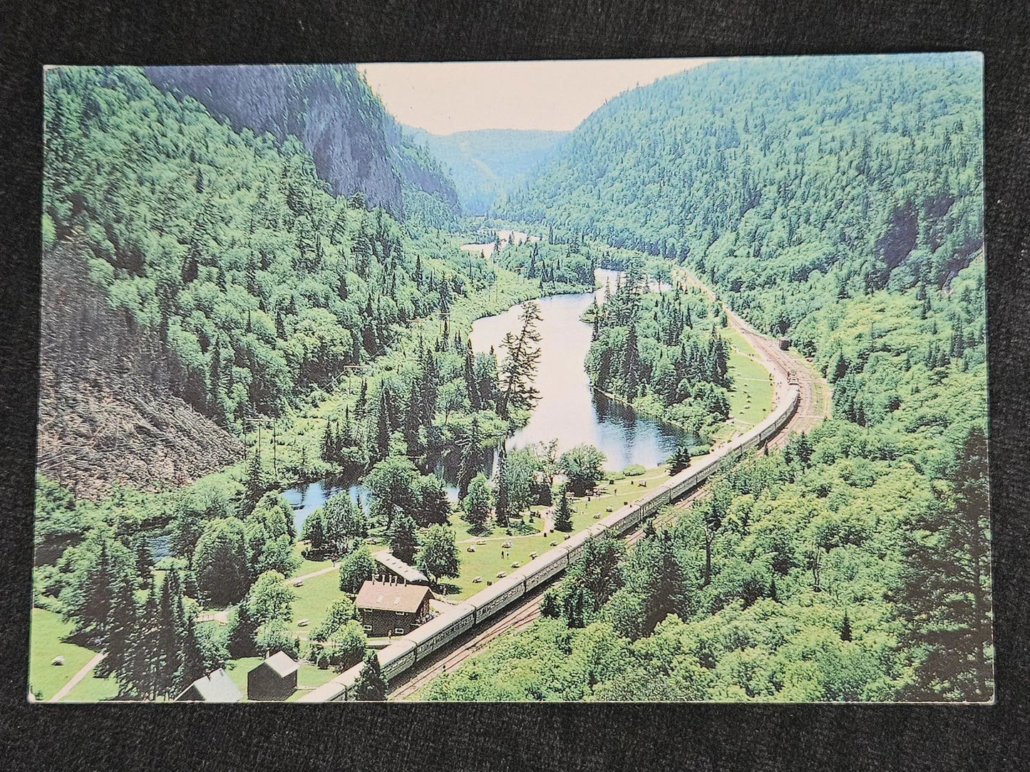 Agawa Canyon Passenger Train Passing through Valley on Railroad Tracks - Scenic Marie Ontario Canada