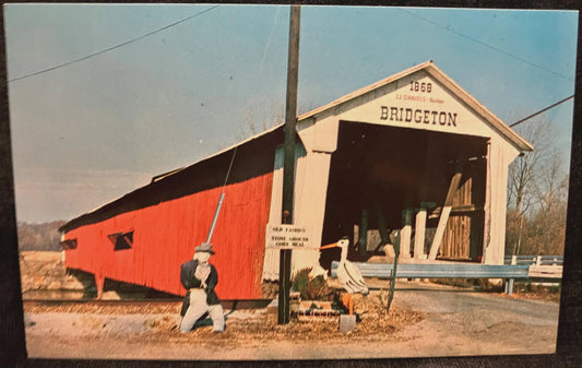 Scarecrow in front of Bridgeton Bridge in Parke County, Indiana - Photo: Mitchell - Vintage Covered Bridge Postcard
