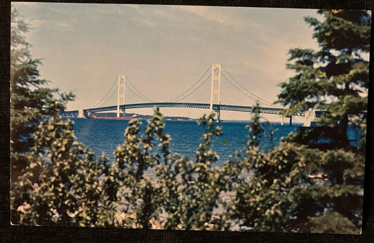 The Mackinac Bridge over the Straits of Mackinac in Michigan - Photo: Lucy Gridley - Vintage Bridge Postcard