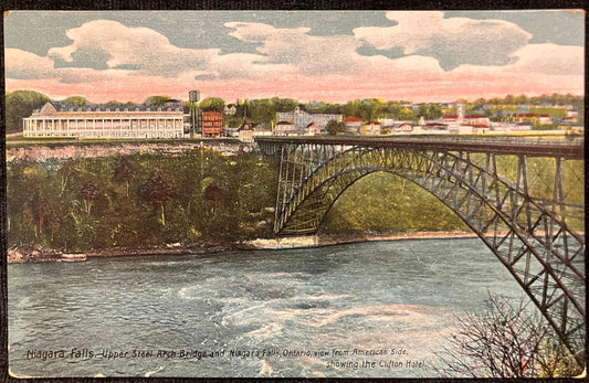 Niagara Falls. Upper Steel Arch Bridge and Niagara Falls, Ontario, view from American Side, showing the Clifton Hotel - Made in Germany