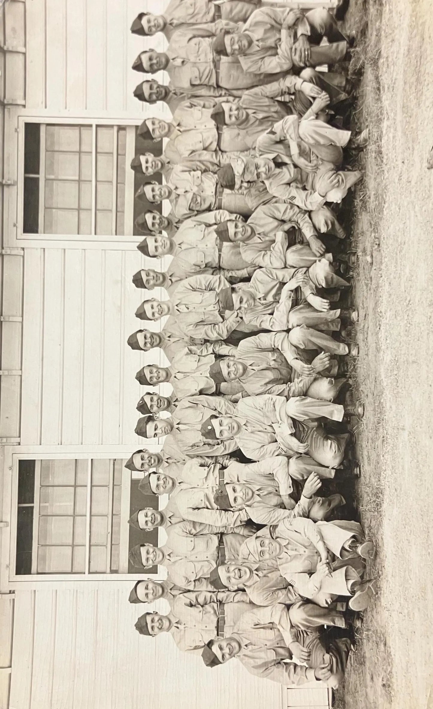 RPPC - WWII Soldiers Pose In front of their Barracks - Vintage Armed Forces Postcard