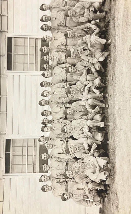 RPPC - WWII Soldiers Pose In front of their Barracks - Vintage Armed Forces Postcard