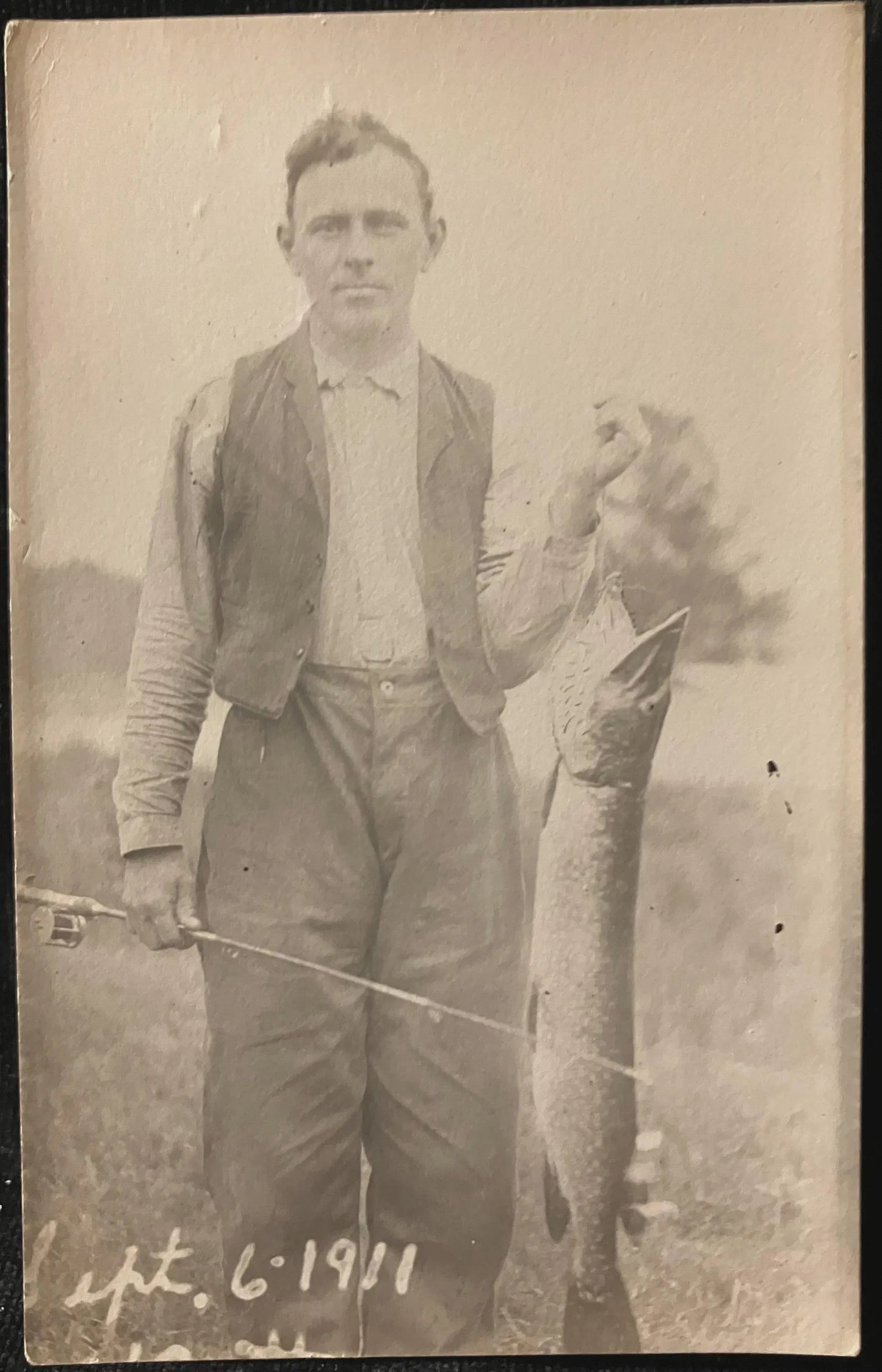 RPPC - Man Standing with Northern Pike - Sept. 6, 1911 - Vintage Fishing Postcard