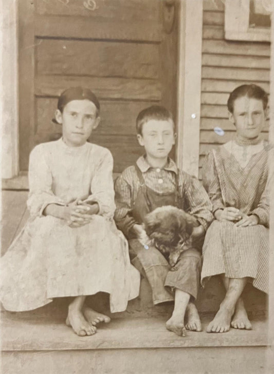 RPPC - Kids and pet sitting on steps - Vintage Postcard