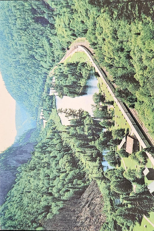 Agawa Canyon Passenger Train Passing through Valley on Railroad Tracks - Scenic Marie Ontario Canada