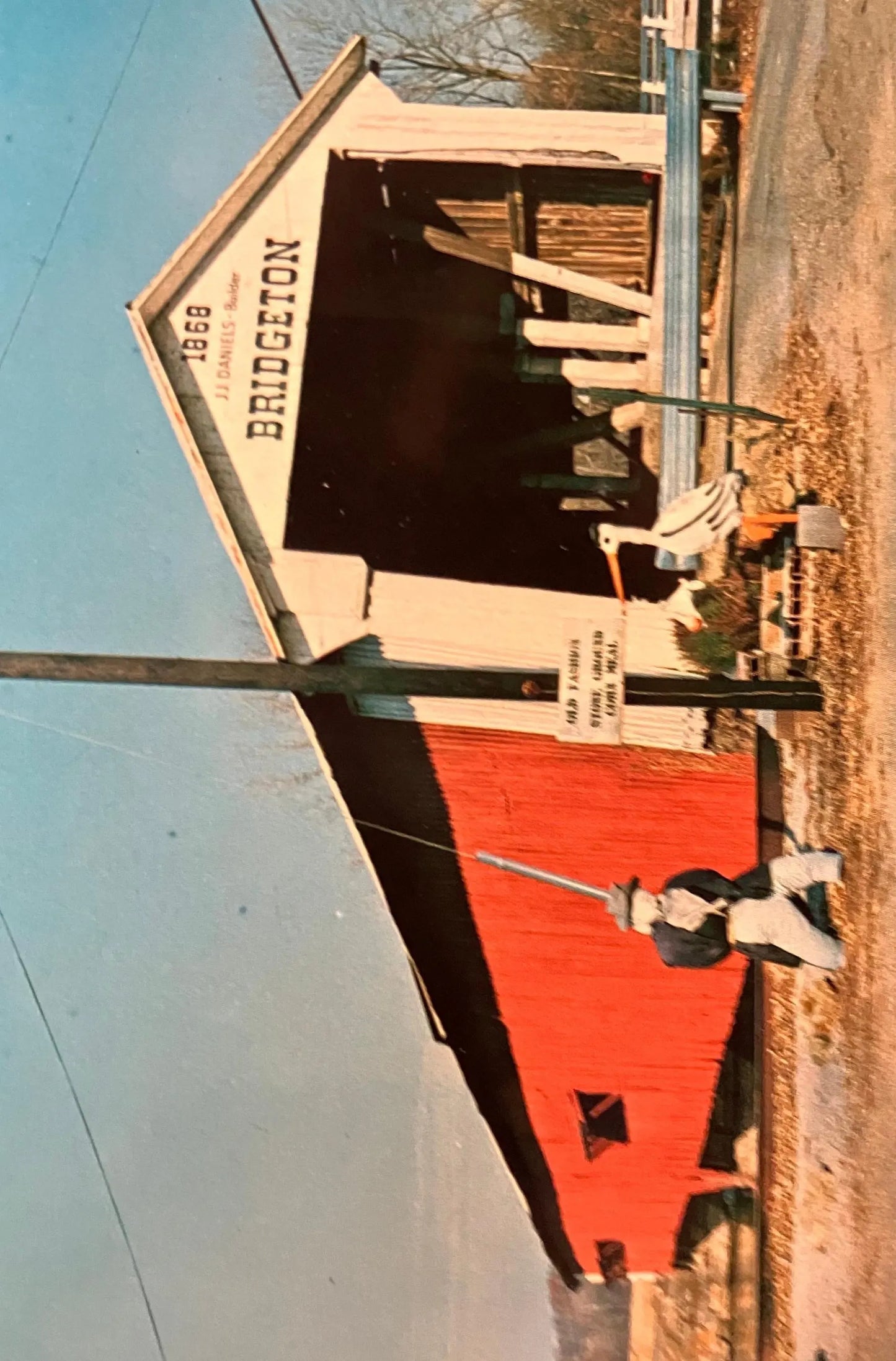 Scarecrow in front of Bridgeton Bridge in Parke County, Indiana - Photo: Mitchell - Vintage Covered Bridge Postcard
