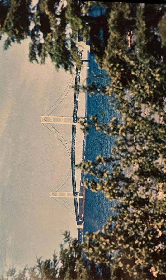 The Mackinac Bridge over the Straits of Mackinac in Michigan - Photo: Lucy Gridley - Vintage Bridge Postcard