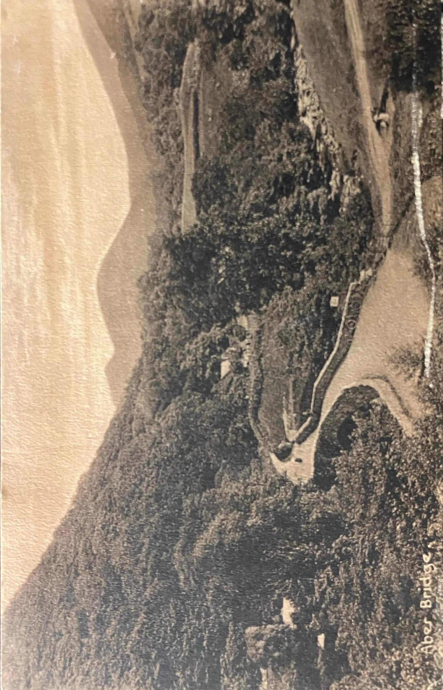 Aerial view of a landscape with a river and surrounding area