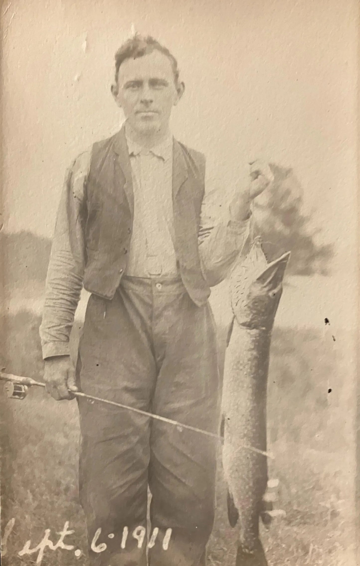RPPC - Man Standing with Northern Pike - Sept. 6, 1911 - Vintage Fishing Postcard