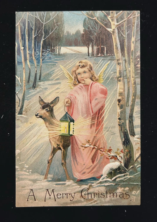 A Merry Christmas - Angel with fawn and lantern - Vintage Holiday Postcard