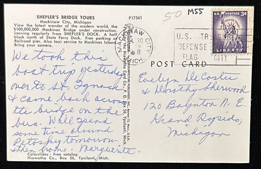 Vintage postcard of Mackinac Bridge construction, back. Handwriting, stamp and postmark.