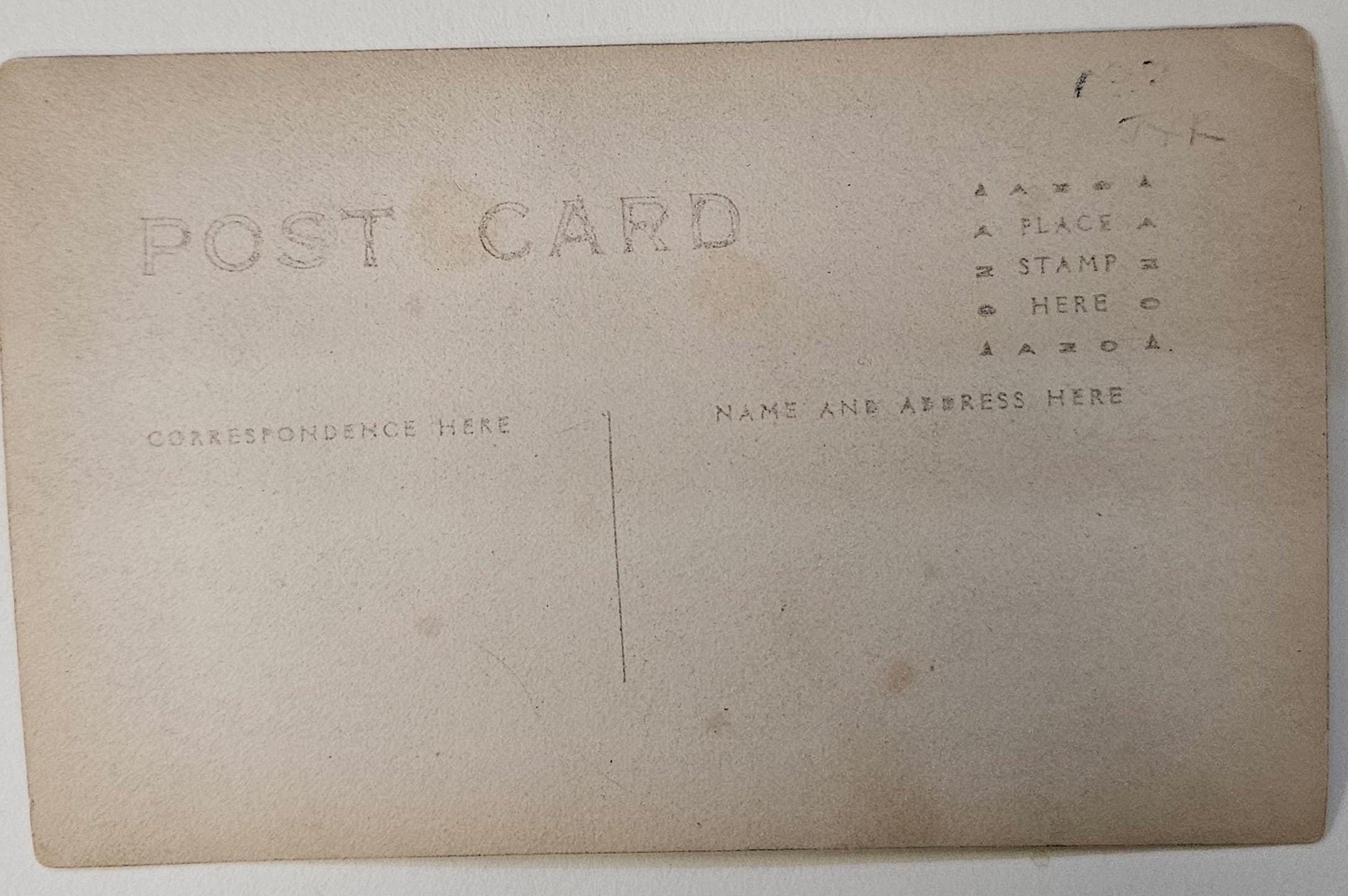 This RPPC came from an estate sale in Michigan. It had a Note attached on front which reads: "Maybe 