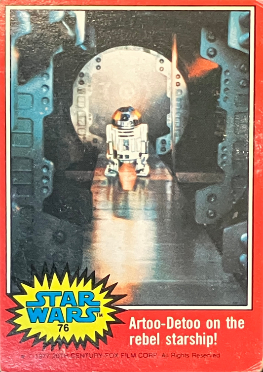 Front of Star Wars trading card: Artoo-Detoo on a rebel starship, red border.